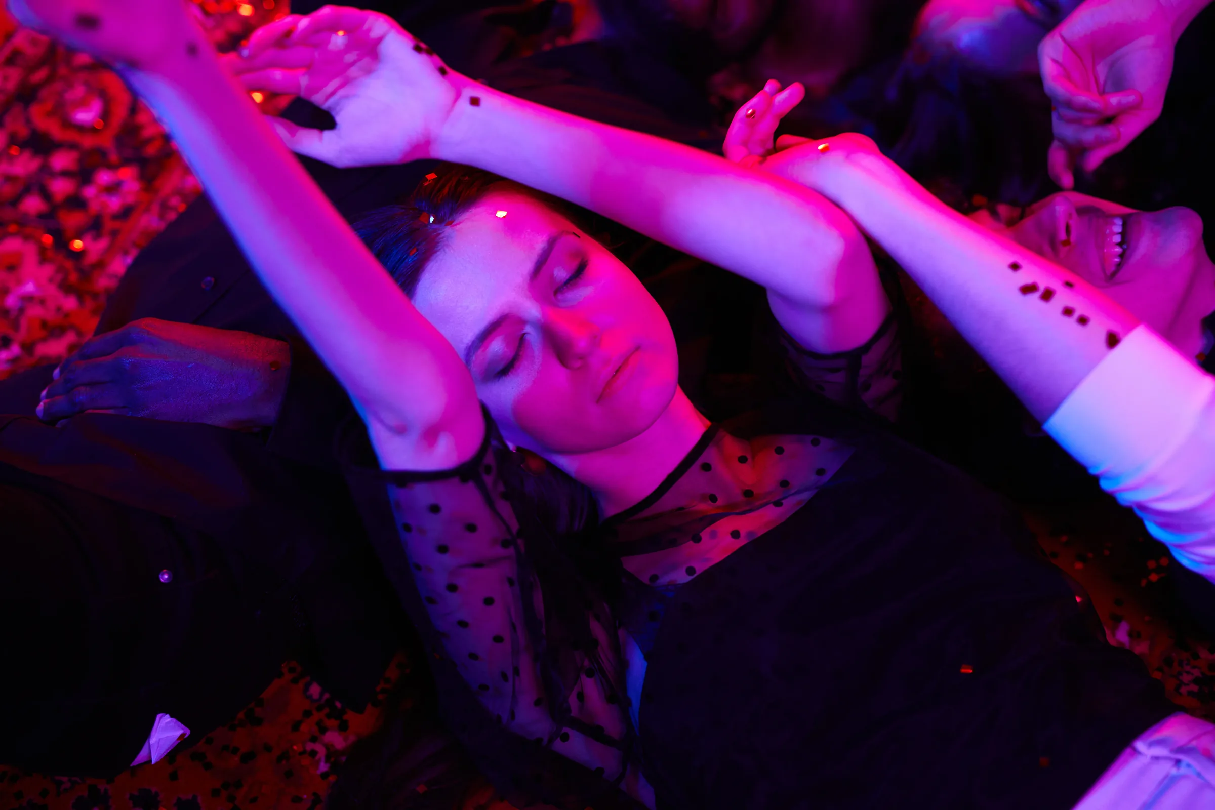 Miami nightlife crowd in a Wynwood warehouse club at night