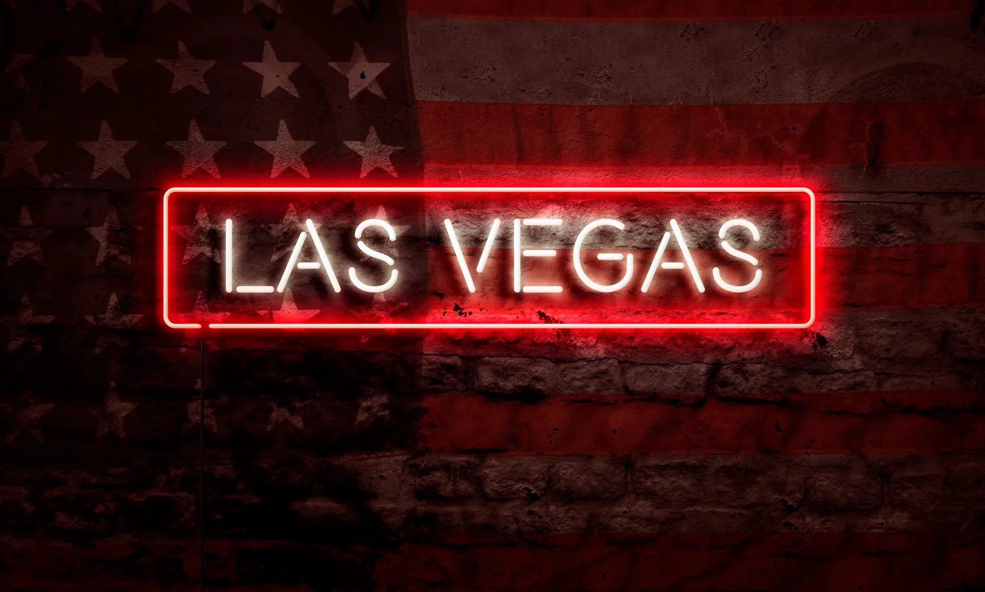 Bars in Las Vegas — a red neon Las Vegas sign glowing on a downtown bar's brick wall